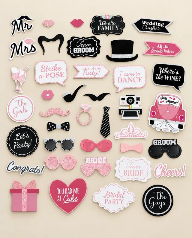 Pancartes et accessoires de mariage roses et noirs